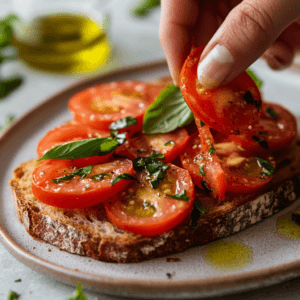 Ultimate Tomato Tartine with fresh tomatoes and pesto on toasted bread