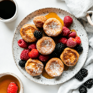 Golden cinnamon sugar French toast muffins with a crisp sugary