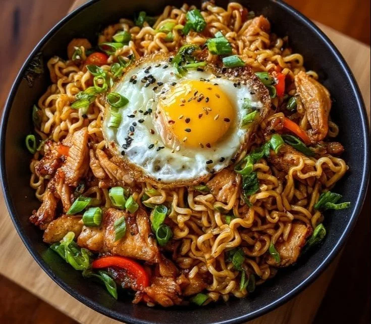 Delicious chicken ramen stir fry with vegetables and sauce in a bowl