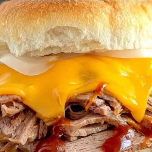 Delicious homemade Copycat Arby's Beef Cheddar sandwich with beef and cheddar.