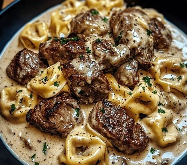Cracked Garlic Steak Tortellini served in creamy sauce