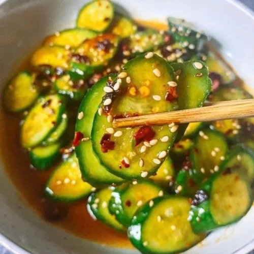 Easy Asian cucumber salad with fresh vegetables and sesame dressing