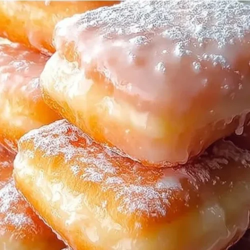 Glazed buttermilk beignet squares drizzled with icing