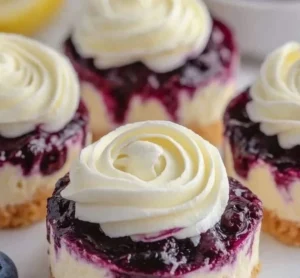 Healthy mini lemon blueberry cheesecakes with vibrant blueberries and lemon zest