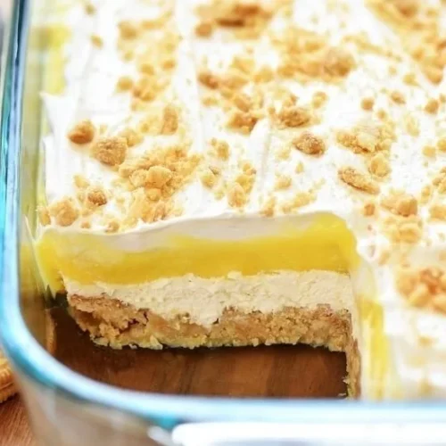 Heavenly Oreo lemon dessert with creamy layers and a zesty topping.