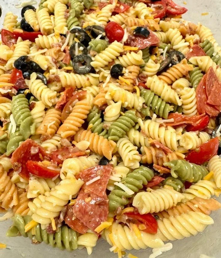 Delicious Olive Garden pasta salad with fresh vegetables and dressing
