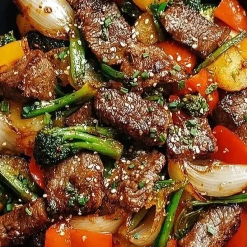 Colorful quick weeknight stir fry with fresh vegetables and protein in a wok