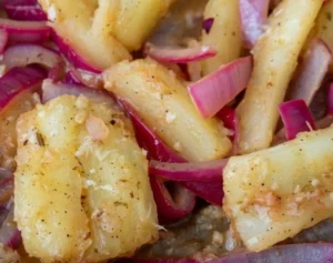 Delicious cassava dish served with vibrant mojo sauce