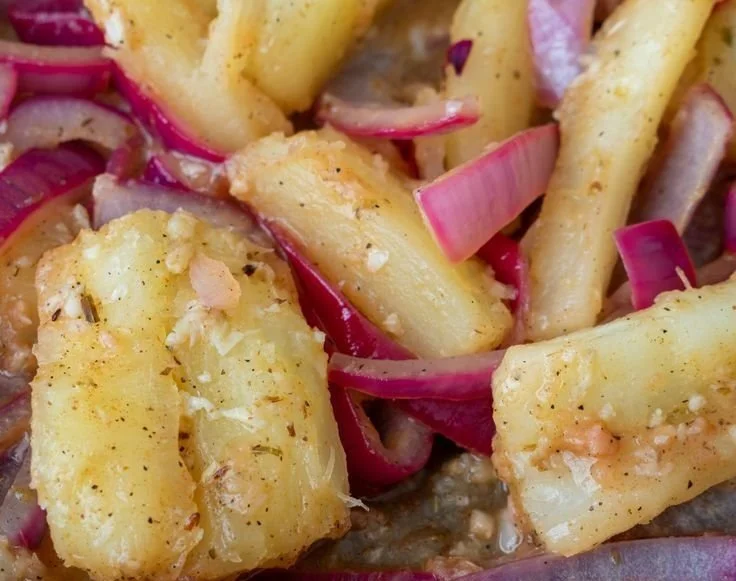 Delicious cassava dish served with vibrant mojo sauce