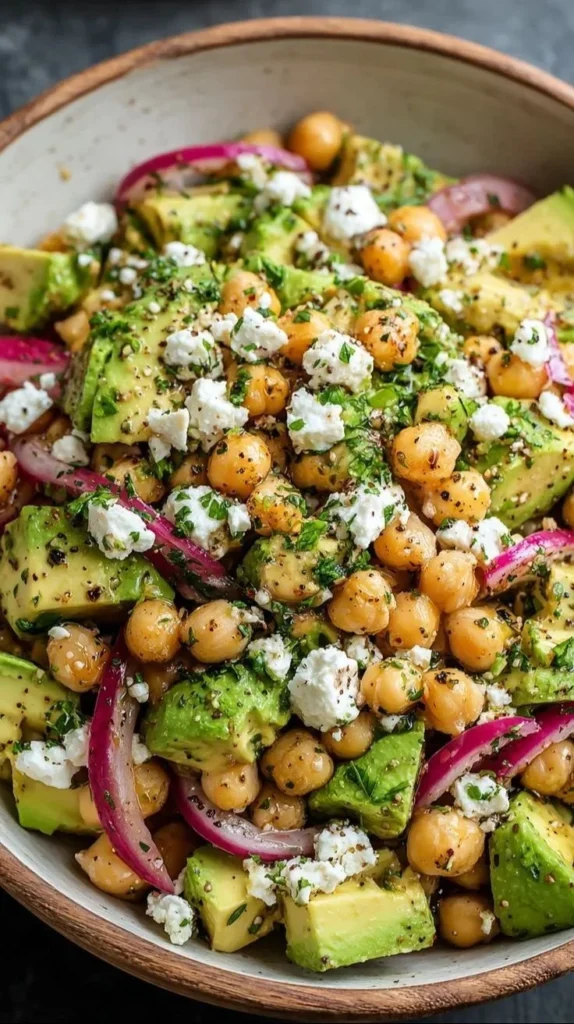 Chickpea Feta Avocado Salad served in a bowl with fresh ingredients