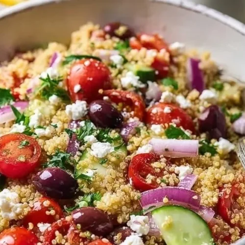 Delicious and colorful Mediterranean grain salad with fresh vegetables