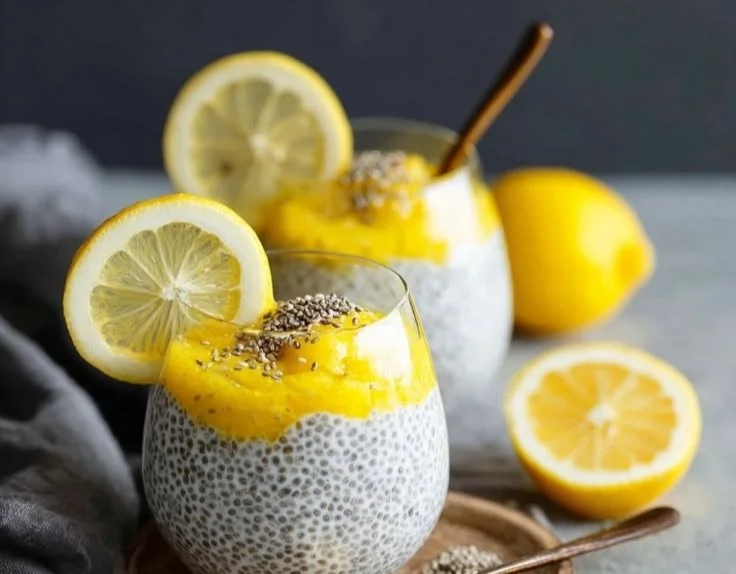Bowl of Lemon Cream Chia Pudding topped with fresh lemon slices