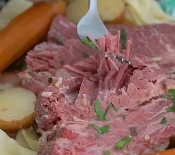 Delicious slow cooker corned beef with cabbage cooked to perfection