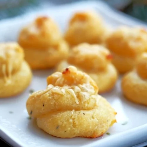 Delicious cheese puffs in a bowl, perfect for snacking and gatherings.