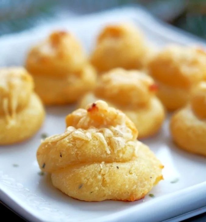 Delicious cheese puffs in a bowl, perfect for snacking and gatherings.