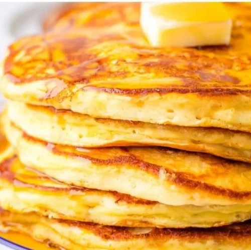 Delicious Cracker Barrel pancakes served with butter and syrup