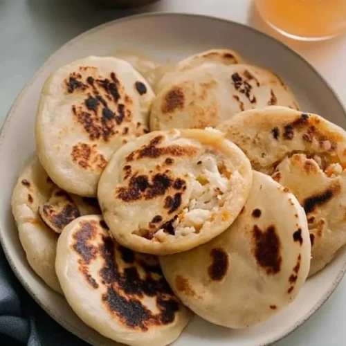 Delicious pupusas with pickled cabbage, a traditional Salvadoran dish