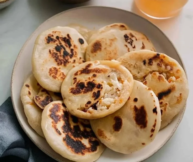 Delicious pupusas with pickled cabbage, a traditional Salvadoran dish
