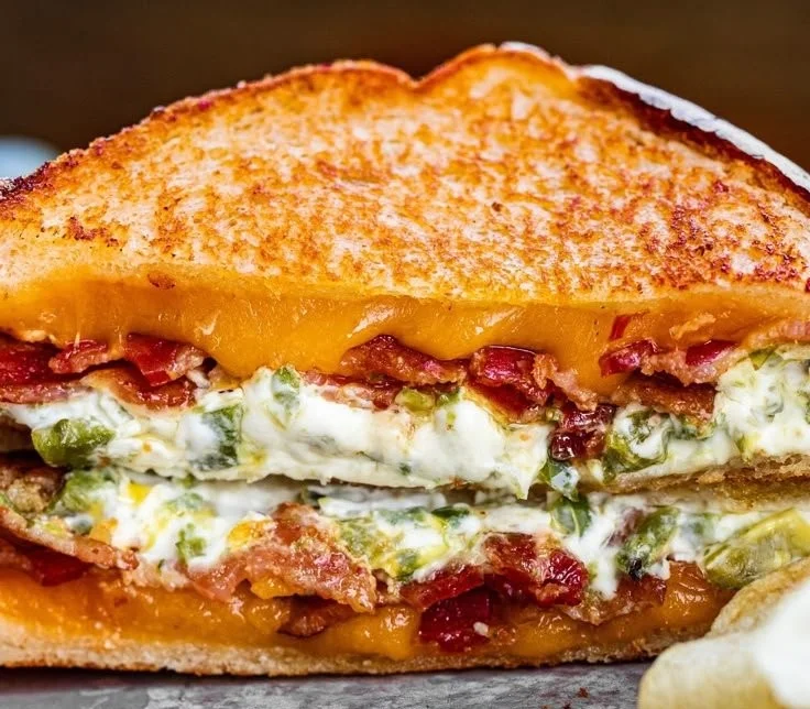 Roasted jalapeno popper grilled cheese sandwich with melted cheese and peppers