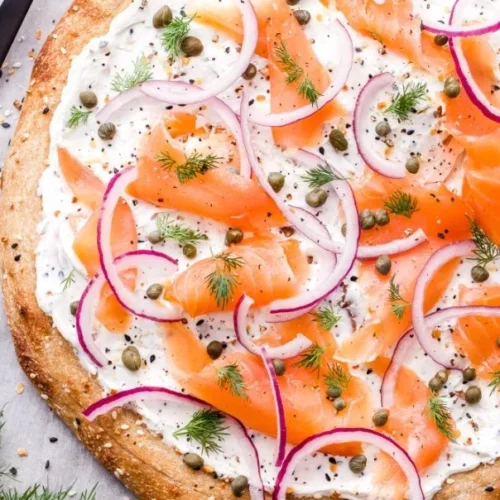 Delicious smoked salmon pizza with fresh toppings