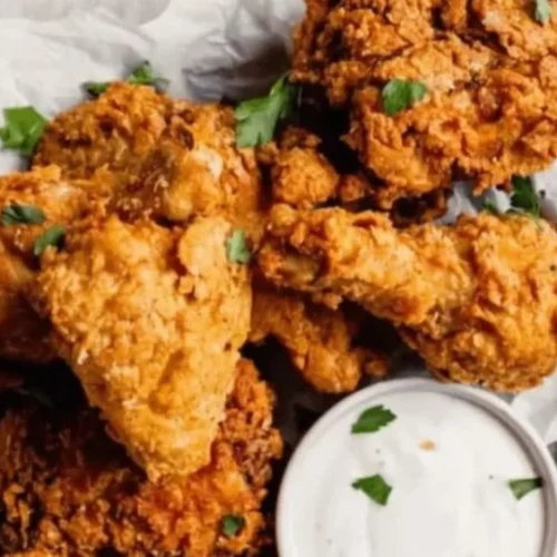 Delicious Southern fried chicken with crispy coating and herbs