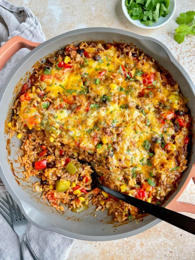 Unstuffed pepper skillet with colorful bell peppers and ground meat in a pan