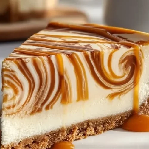 Delicious caramel swirl cheesecake with perfect slices on a white plate