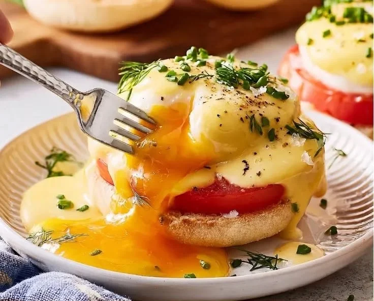 Delicious Eggs Benedict with poached eggs and hollandaise sauce