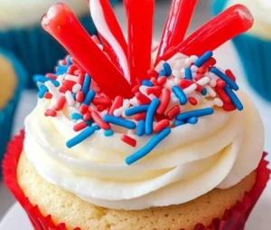 Colorful firecracker cupcakes decorated for a festive celebration.