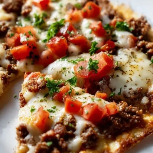 Hobo Beef Flatbread Pizza topped with savory beef and fresh ingredients