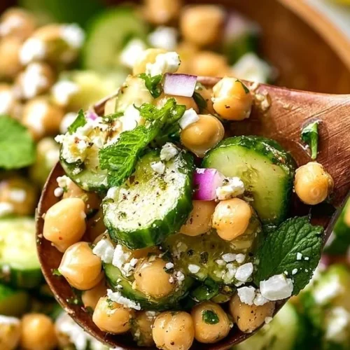 Fresh chickpea cucumber salad in a bowl with vibrant ingredients
