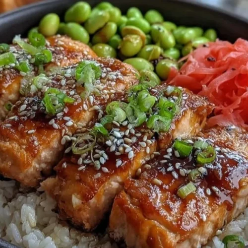 Delicious sheet pan teriyaki salmon bowls with vegetables and rice.