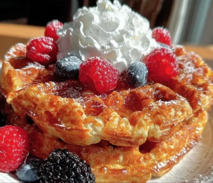 Delicious keto almond flour waffles topped with fresh berries