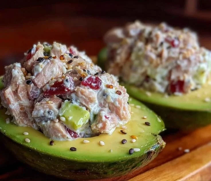 High-protein tuna stuffed avocado garnished and ready to eat
