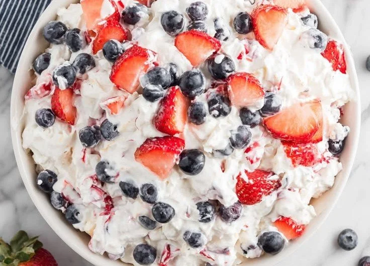 Delicious Red White and Blue Cheesecake Salad served in a bowl