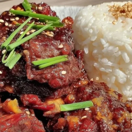 Delicious slow cooker Korean BBQ beef short ribs ready to serve.