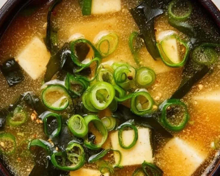 Bowl of traditional Japanese miso soup with vegetables and tofu