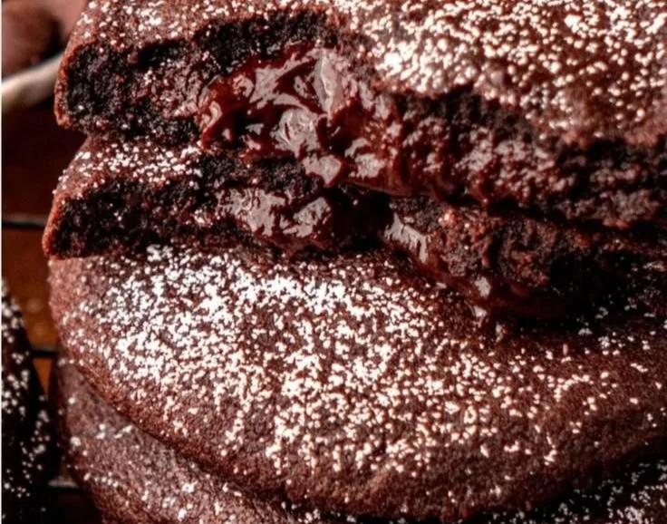 Delicious Chocolate Lava Cookies with molten chocolate centers on a plate.