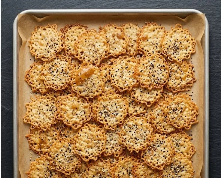 A bowl of crunchy cottage cheese chips, a healthy snack option.
