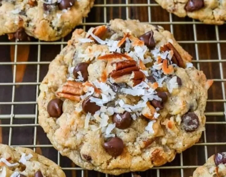 Delicious Cowboy Cookies with chocolate chips and nuts on a plate.