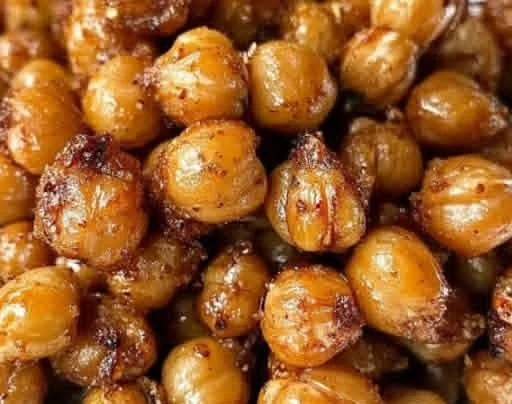 Bowl of crispy roasted chickpeas seasoned for a healthy snack