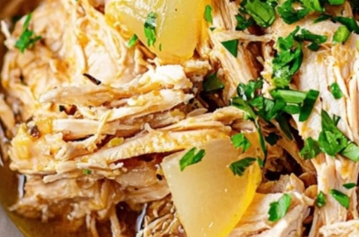 Crockpot Mississippi Chicken dish served with sides