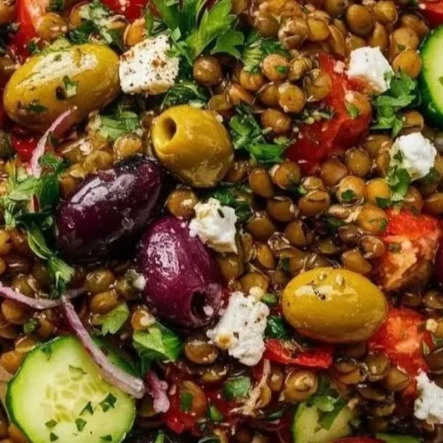 Colorful Mediterranean Lentil Salad with fresh vegetables and herbs