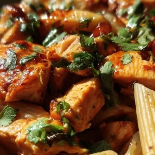 One pot sweet chili BBQ chicken pasta garnished and ready to serve