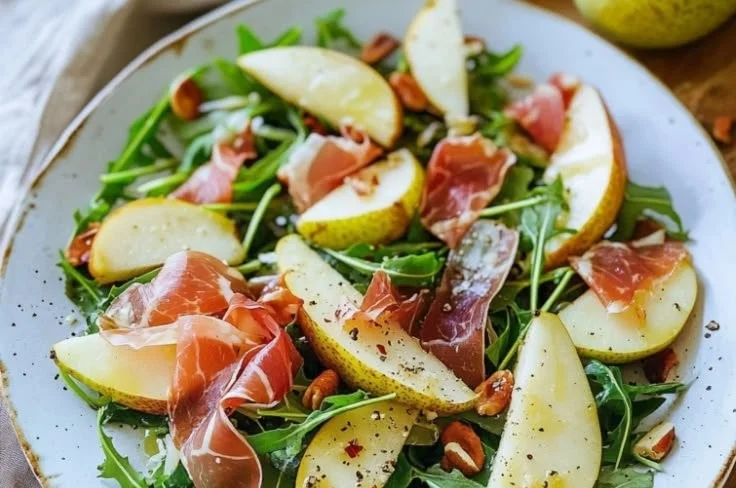 Delicious pear prosciutto rocket salad with fresh ingredients