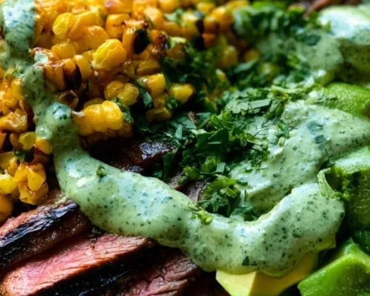 Delicious sun-kissed steak and avocado bowl with fresh ingredients