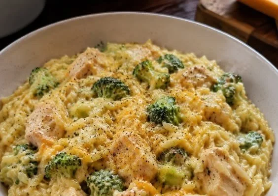 Delicious Chicken Broccoli Cheddar Orzo in a creamy sauce with broccoli and chicken.
